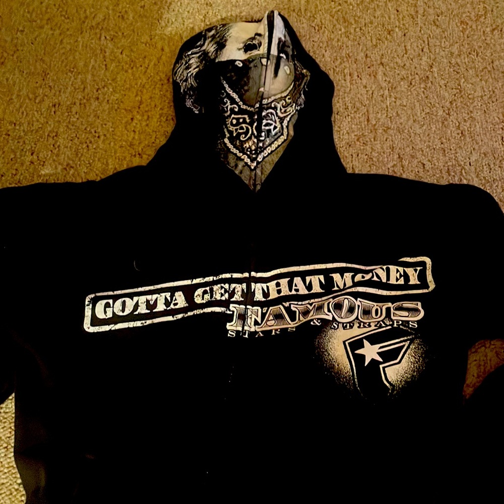 Famous stars & straps hoodie  has tear in side
